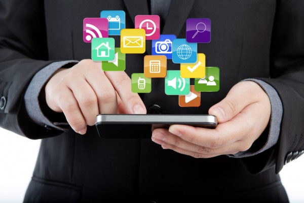 Business man use mobile phone with colorful application icons